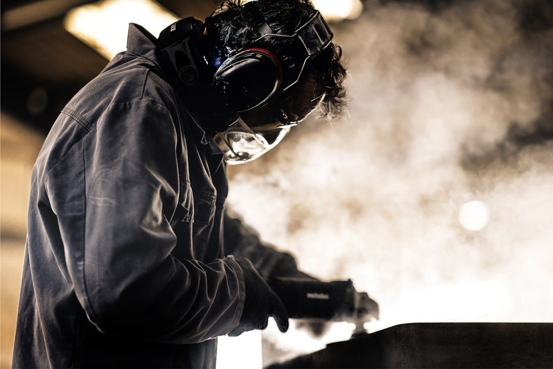 Worker using a CleanSpace powered air-purifying respirator